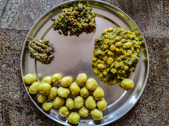 High angle view of fruits in bowl on table