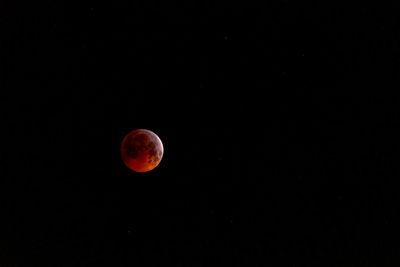 Scenic view of moon against sky at night