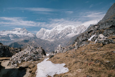 Scenic view of snowcapped mountains against sky