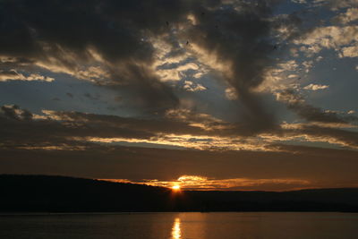 Scenic view of dramatic sky during sunset