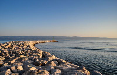 Scenic view of sea against clear sky