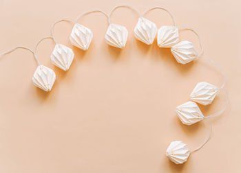 High angle view of pills on white background