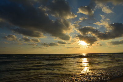 Scenic view of sea against sky during sunset