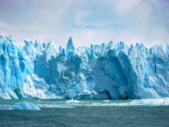 Scenic view of frozen sea against sky