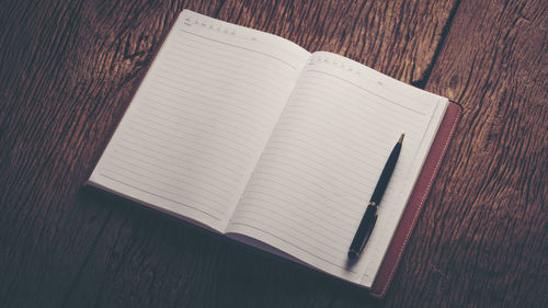 High angle view of open book on table