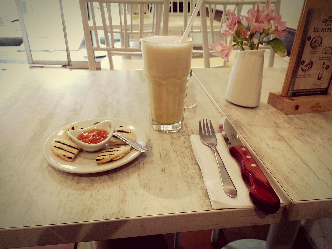 indoors, table, wood - material, high angle view, still life, flower, freshness, home interior, no people, chair, wooden, day, food and drink, restaurant, red, variation, close-up, decoration, vase, shelf