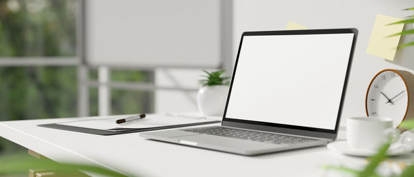 Close-up of laptop on table