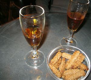 Close-up of wine glasses on table