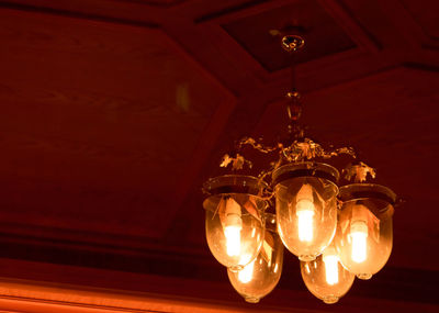 Low angle view of illuminated light bulb