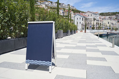 Blank advertising sidewalk chalkboard in the european city