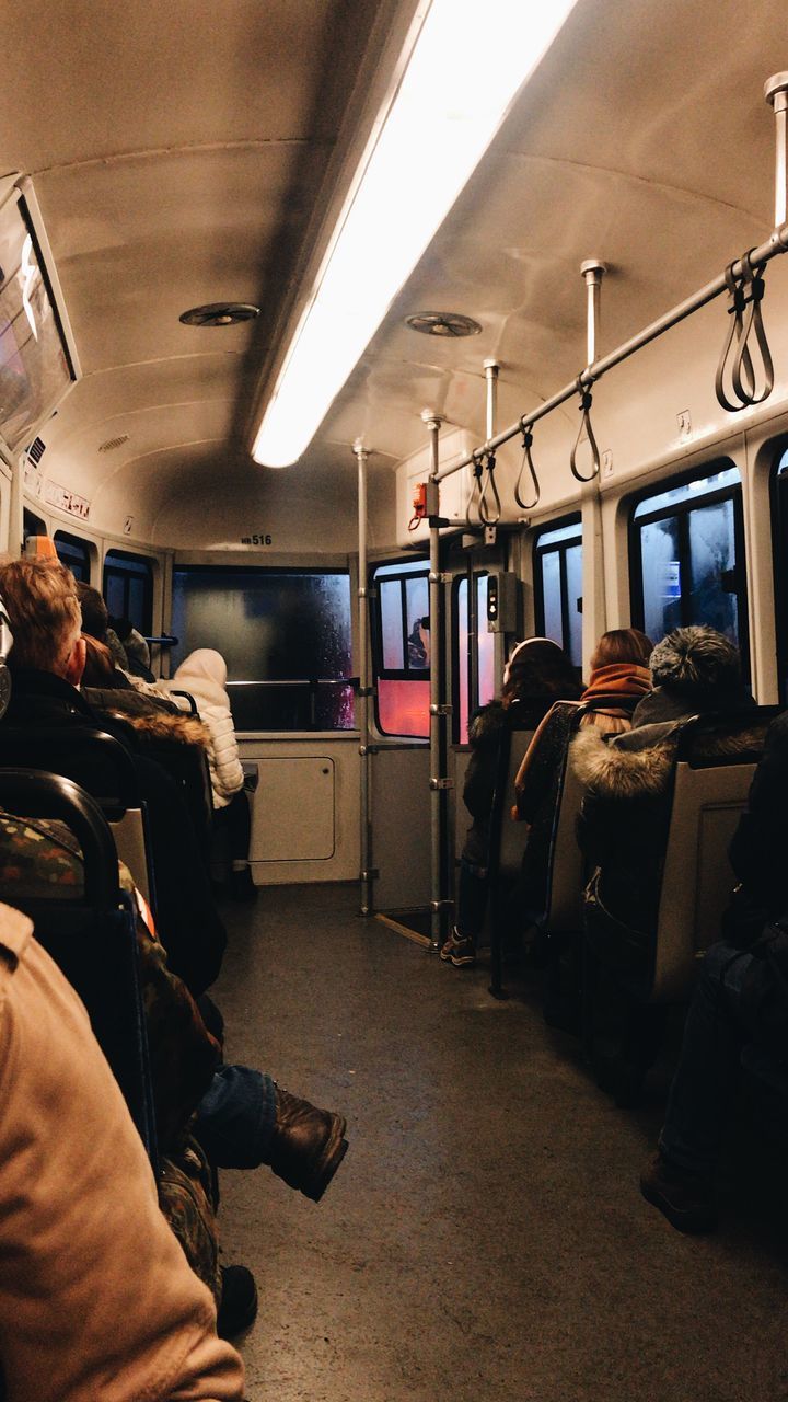 PEOPLE SITTING AT TRAIN