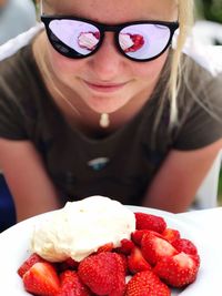 Portrait of woman with chocolate cake