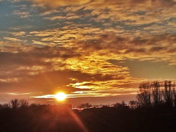 Sun shining through clouds