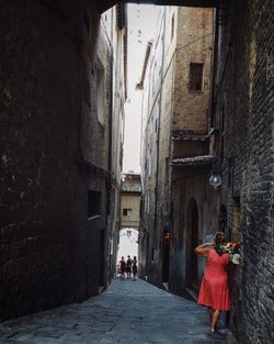 People walking on road in city