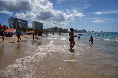 Tourists enjoying at beach