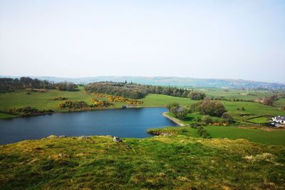 Scenic view of lake against clear sky