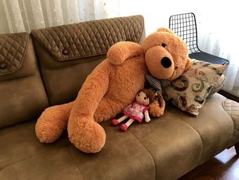 High angle view of stuffed toy on sofa at home