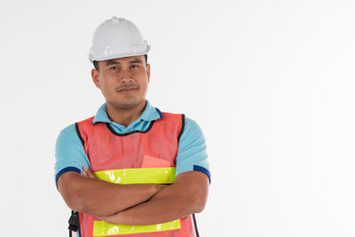 Portrait of man working over white background