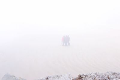 Man on snow covered landscape