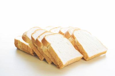 Close-up of cake against white background