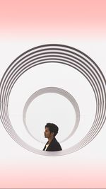 Portrait of woman standing against sky