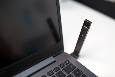 Close-up of laptop on table