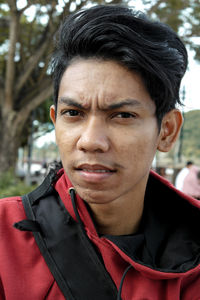 Close-up portrait of young man outdoors