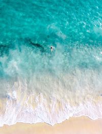 High angle view of person swimming in sea