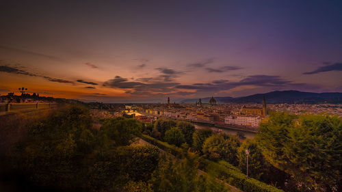 High angle view of cityscape against sky during sunset
