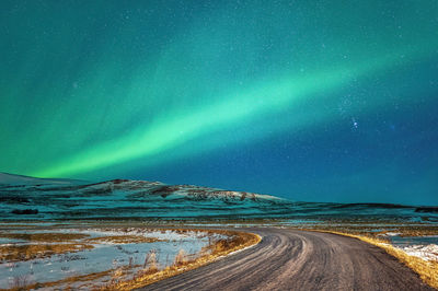 Scenic view of sea against sky at night