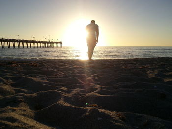 Scenic view of sea at sunset
