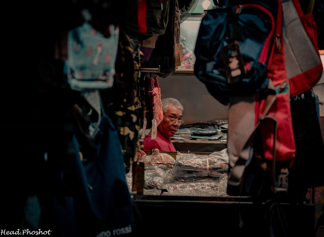 GROUP OF PEOPLE IN MARKET