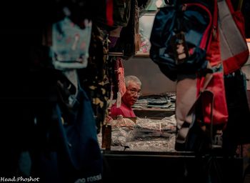 People at market stall