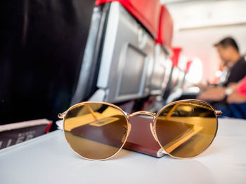 Close-up of sunglasses on table