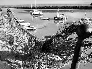 High angle view of sailboats moored in sea