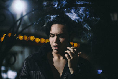 Portrait of man smoking