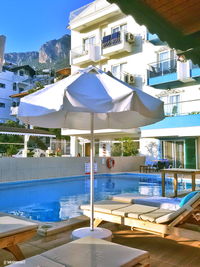 View of swimming pool against buildings