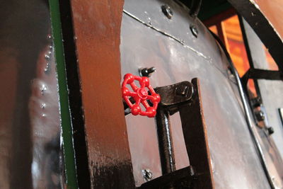 Low angle view of valve on machinery