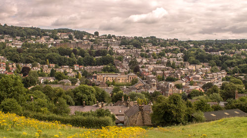 Scenic view of residential district against sky