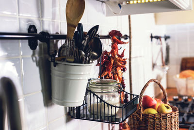 Decorative ornate red dried-up peppers on white vintage kitchen. white interior facades rustic