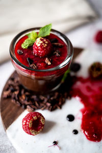 High angle view of strawberries in bowl on table