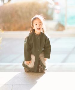 Portrait of cheerful asian girl