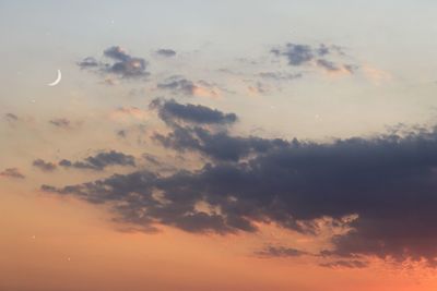 Low angle view of dramatic sky during sunset