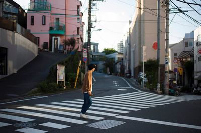 Woman crossing road