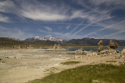 Scenic view of arid landscape against sky
