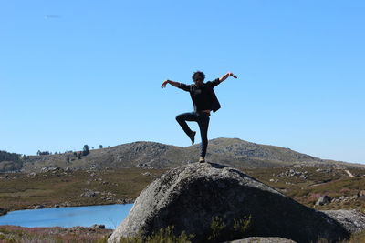 Man standing on one leg