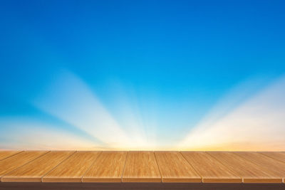 Low angle view of roof against clear blue sky