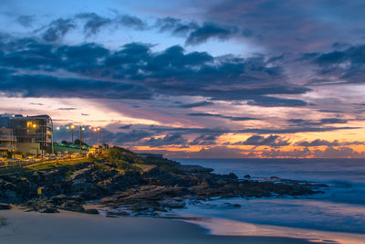 Scenic view of sea against cloudy sky