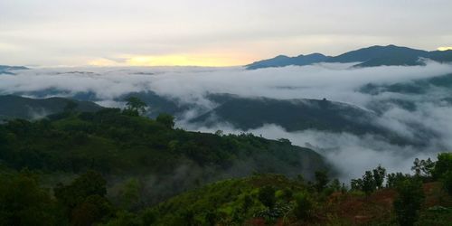 Scenic view of mountains against sky during sunset