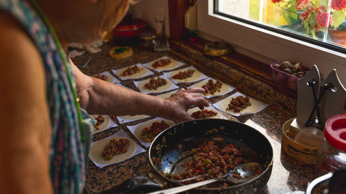 Woman making patty